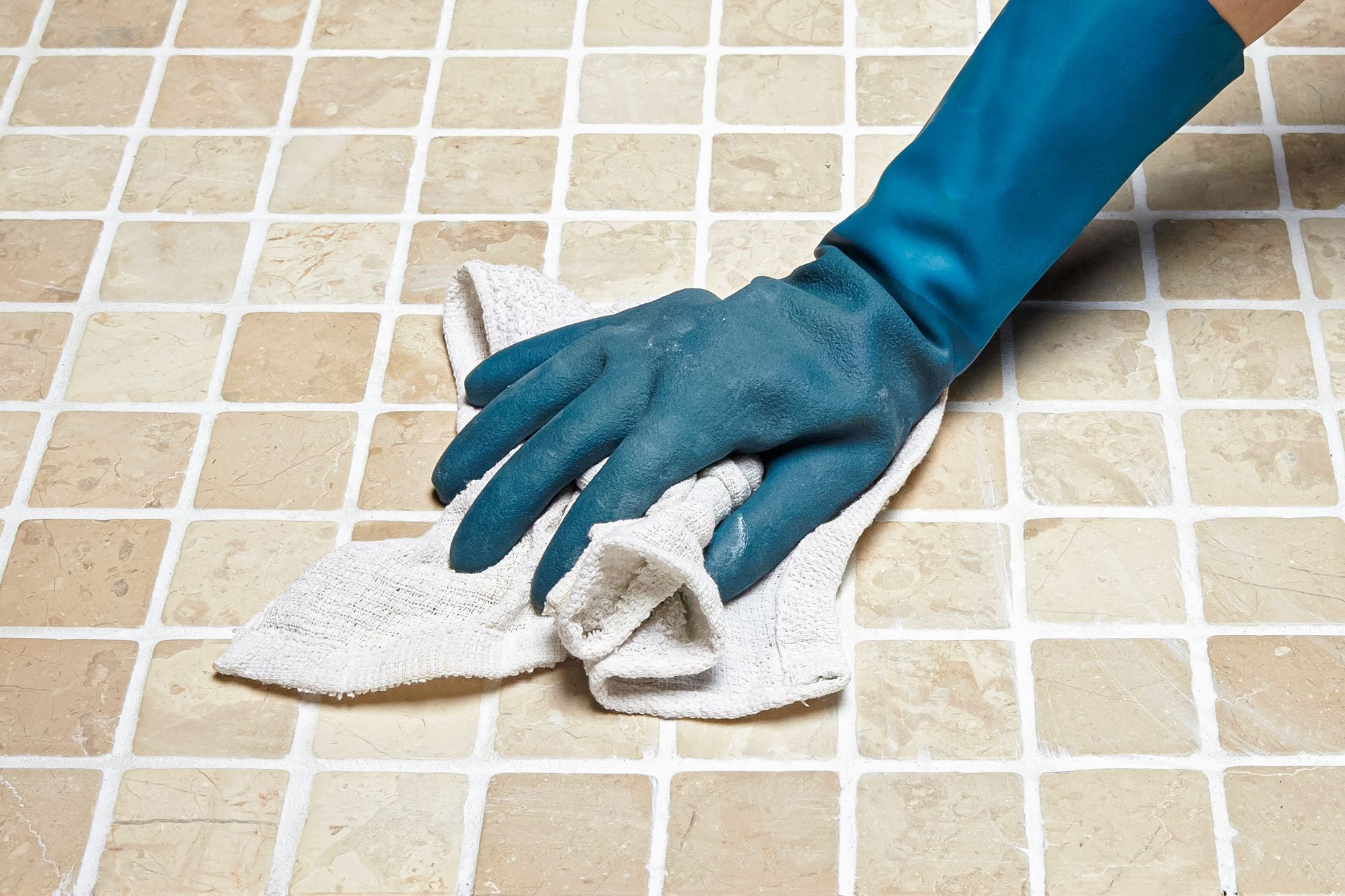 How To Whiten Grimy Grout, Clearing Tiles with Cloth with Hand wearing Rubber Gloves