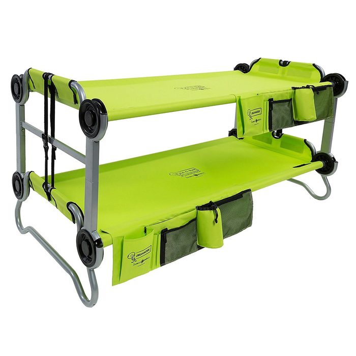 A portable, double-decker bunk bed features vibrant green fabric sleeping surfaces, supported by a silver metal frame, with storage pockets on the sides.