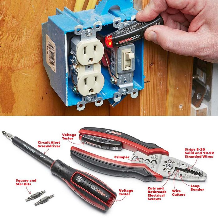 A person uses a voltage tester on an electrical outlet and switch installation, with tools like a crimper and screwdriver on a work surface below.