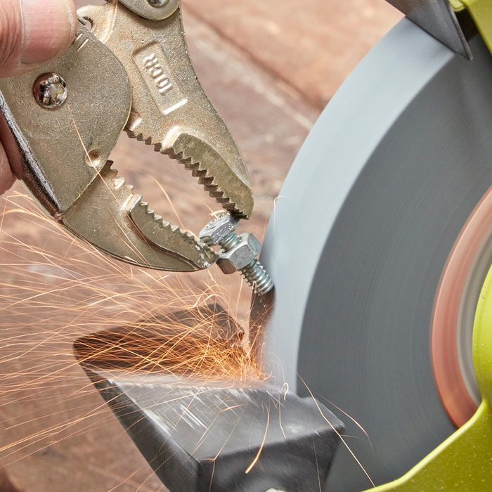 grind small objects safely using pliers