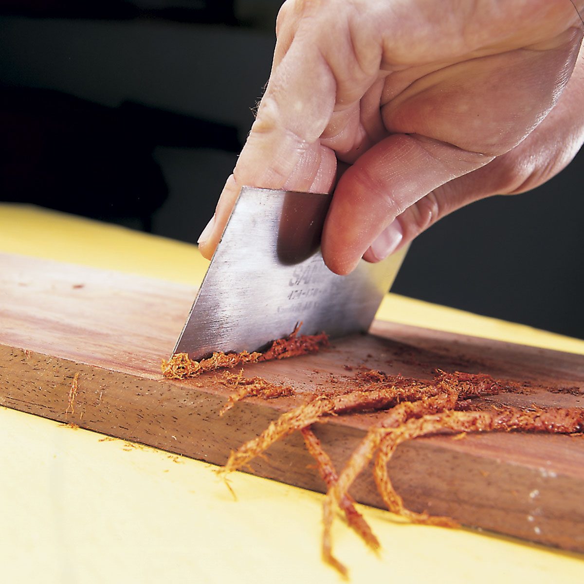 using a cabinet scraper