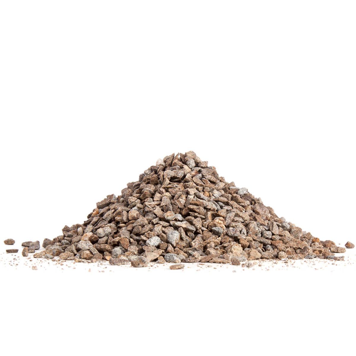 A pile of small, irregularly shaped brown stones sits on a flat surface, surrounded by scattered debris, against a plain white background.