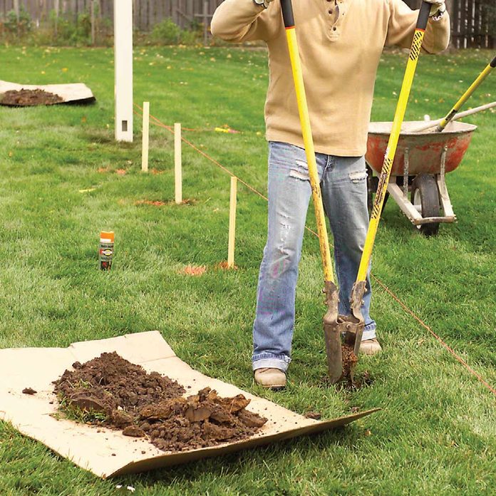 cover grass while digging holes fence