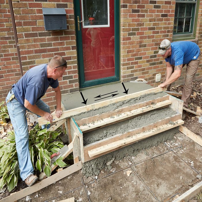 Screed away the top of the form | Construction Pro Tips