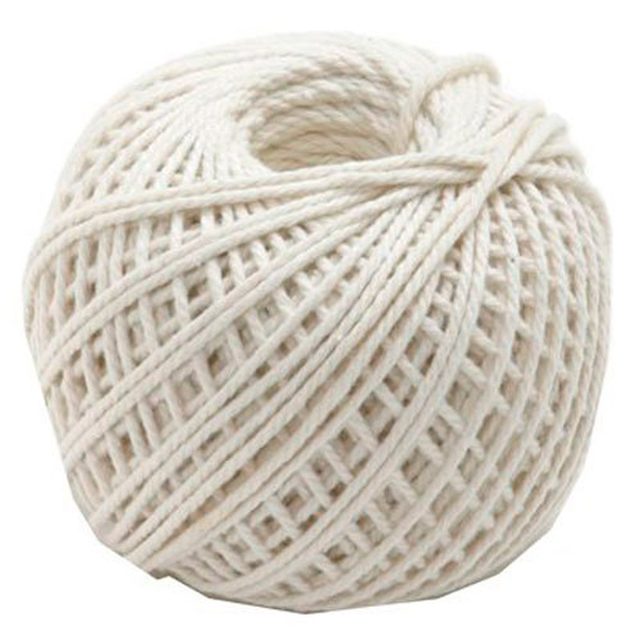 A white ball of twine sits in a neutral setting, coiled tightly with strands forming a crisscross pattern, ready for use in various crafting projects.