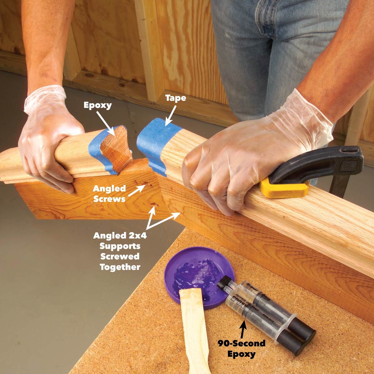 A person glues and clamps two wooden pieces together using epoxy and tape, surrounded by a workbench and tools in a workshop environment.