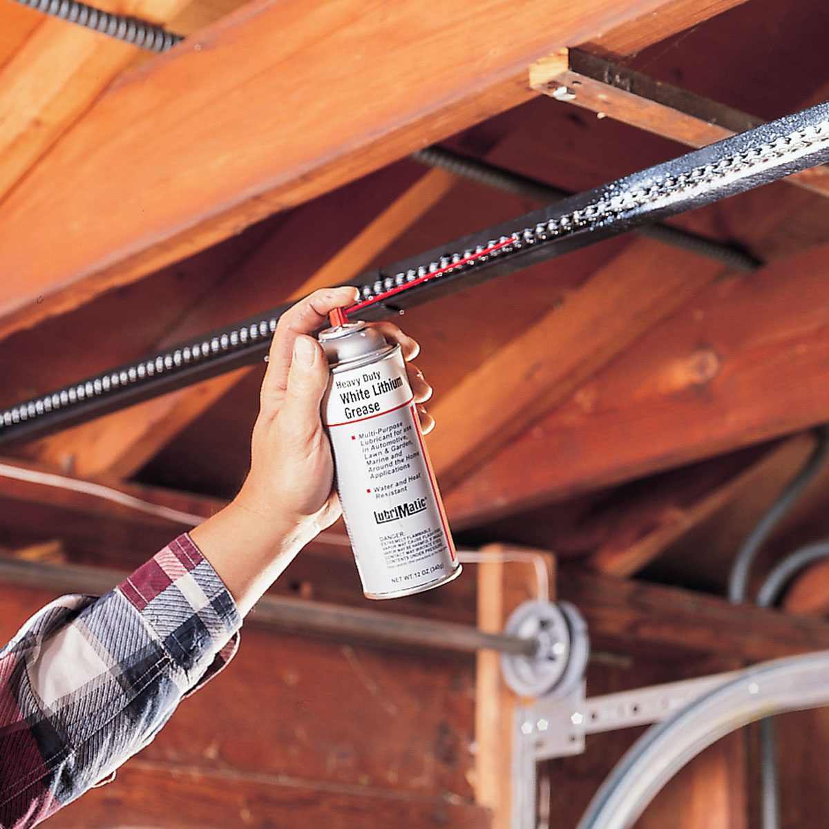 Lubricating the chain with white lithium grease