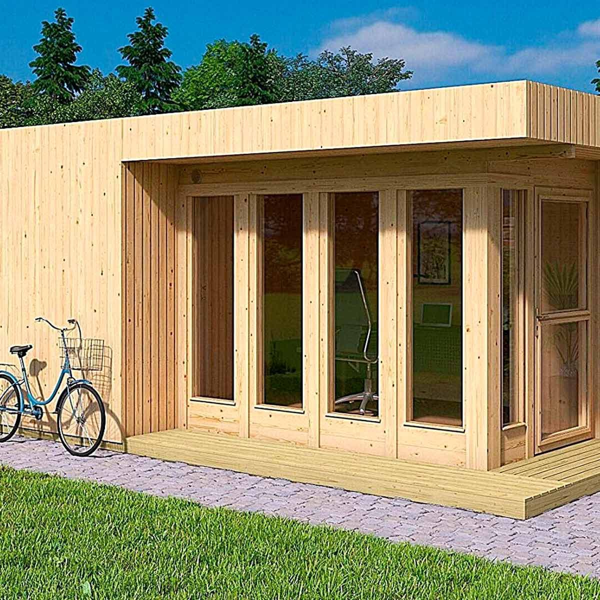 A wooden garden shed features large glass windows and a door, while a bicycle rests nearby, surrounded by green grass and trees.