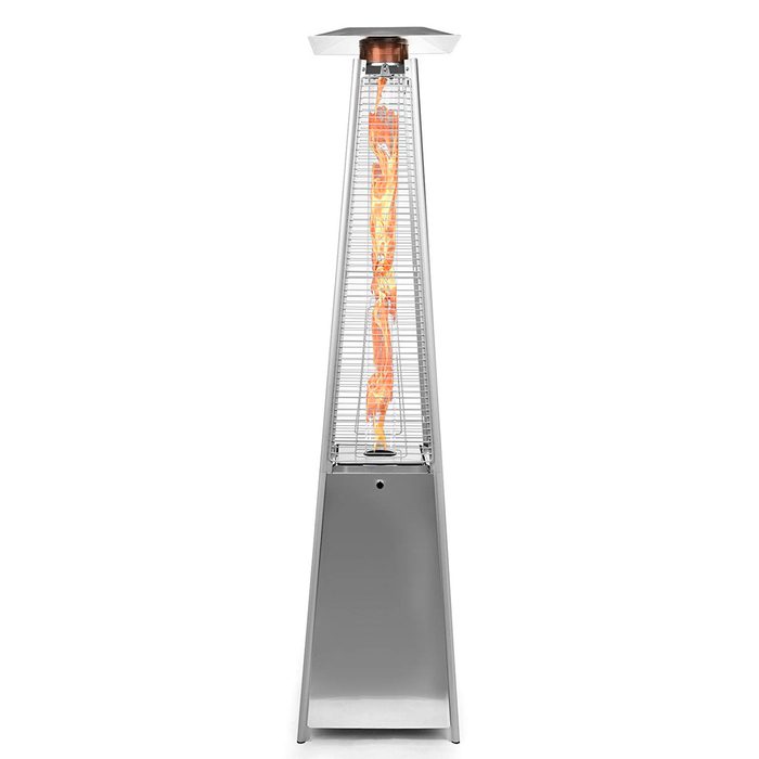 A tall, stainless steel patio heater emits a flame vertically from the center, surrounded by a grid structure, designed for outdoor warmth and ambiance.