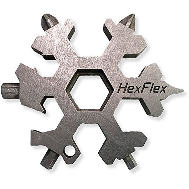 A multi-tool shaped like a snowflake sits against a neutral background, featuring various tool tips for different functions and labeled “HexFlex.”