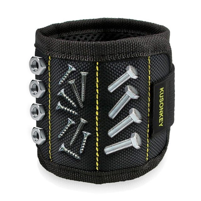 A black magnetic wristband holds metal screws and nuts, designed for easy access during construction or repair tasks in various environments.
