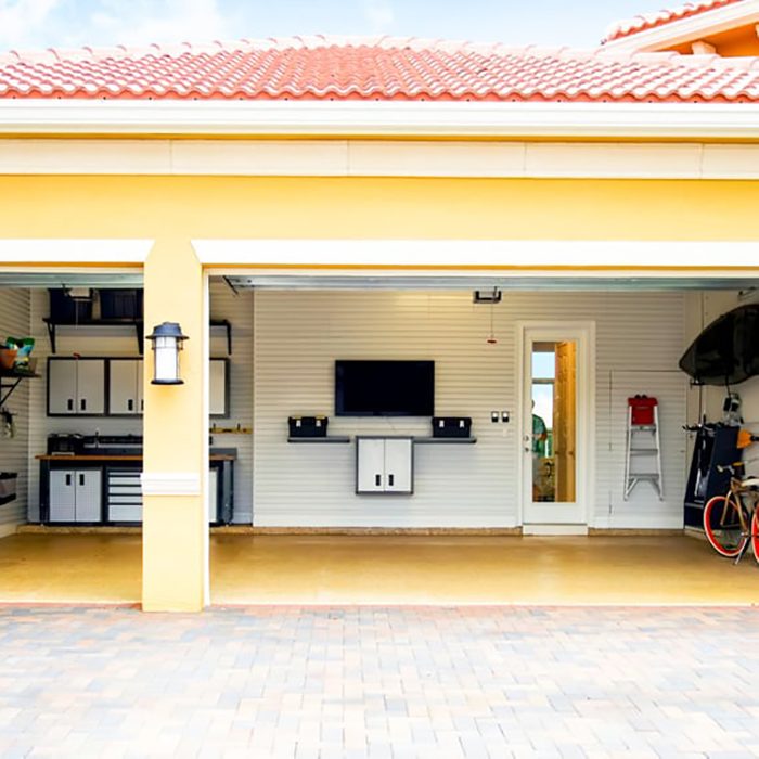 Tv In Garage Paver Driveway Is 1