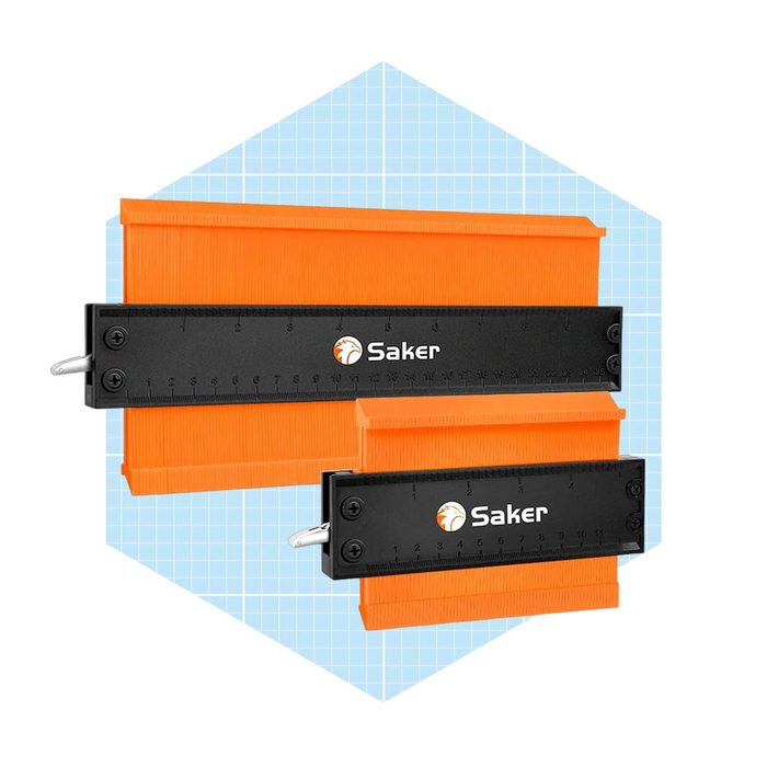 Two profile gauges with orange plastic sides and black metal bases are positioned against a light blue grid background, ready for precise measurements.