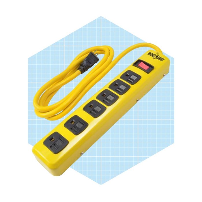 A yellow power strip with multiple outlets and a red switch connects to an electrical source, set against a light blue grid background.