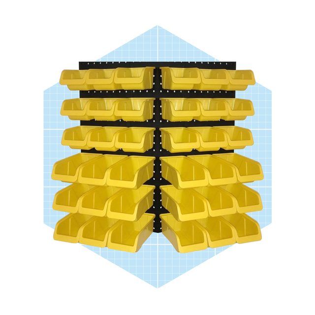 Yellow storage bins are arranged on a black shelving unit, organized neatly in rows against a light blue grid background.