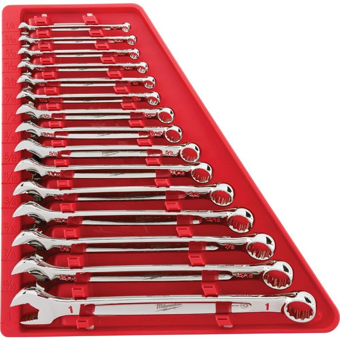 A triangular rack holds a set of shiny chrome wrenches, each labeled with their size, organized neatly for easy access in a tool storage context.