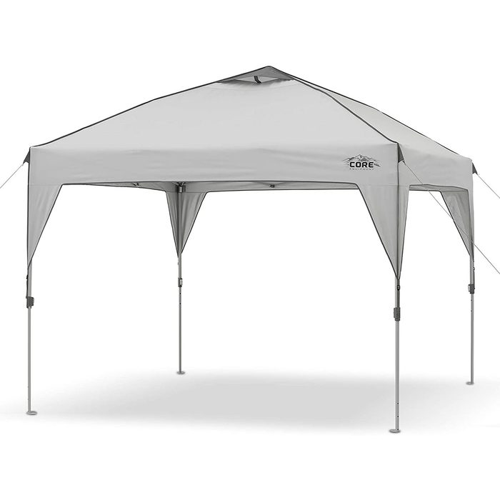 A large, gray pop-up tent stands on four legs, providing shade in an outdoor setting, with no visible people or additional items present around it.