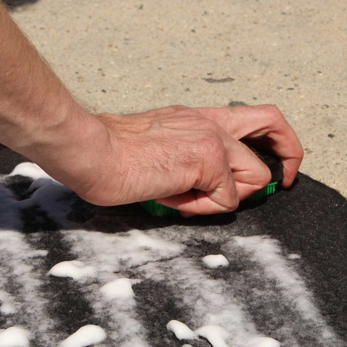 scrubbing car mats