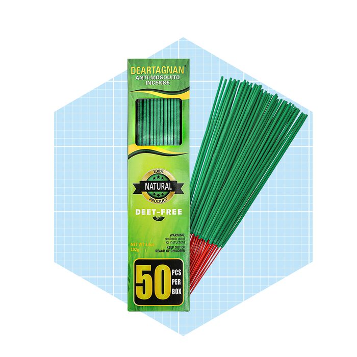 Green anti-mosquito incense sticks are packaged in a box, displaying 50 pieces. The setting features a light blue geometric background.