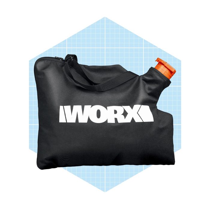 A black bag with a handle holds an orange spout, displaying the 
