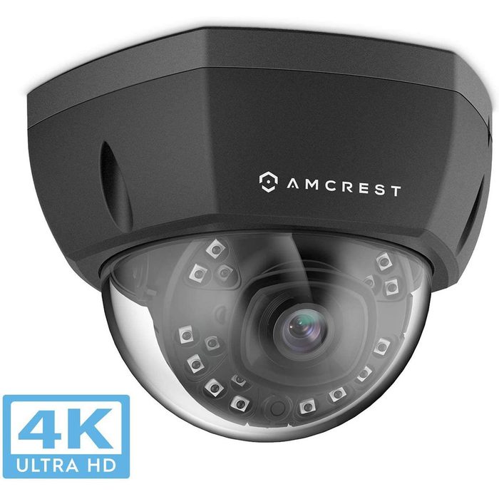 A security camera is mounted on a ceiling, capturing footage with its lens and night vision lights, labeled as 