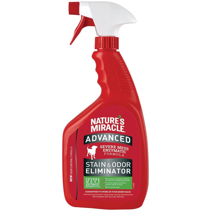 A red spray bottle labeled 