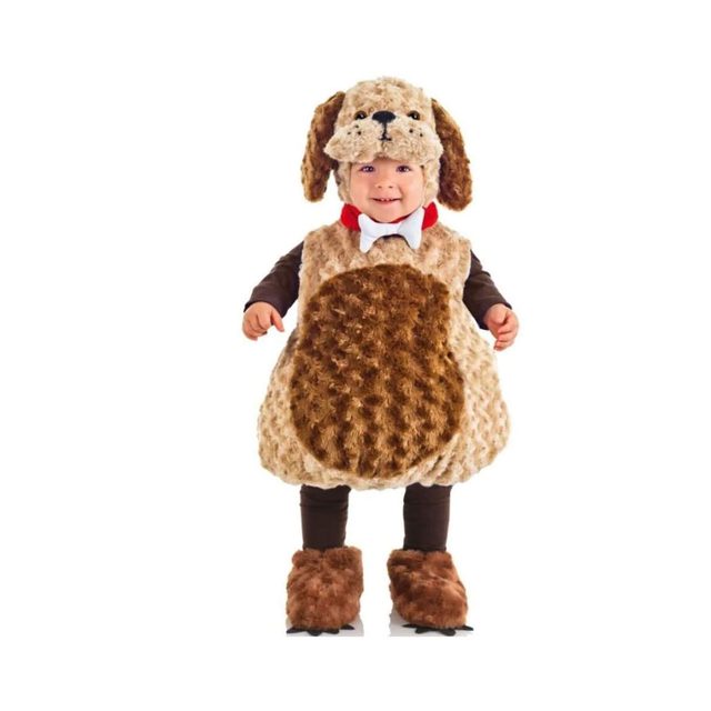 A child wears a fluffy brown dog costume, smiling and standing on a neutral background, mimicking a playful dog character.