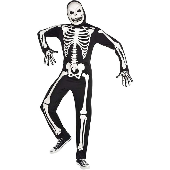 A person wears a black skeleton costume, posing with an exaggerated stance. They're barefoot in black sneakers, against a neutral background, evoking a playful Halloween theme.