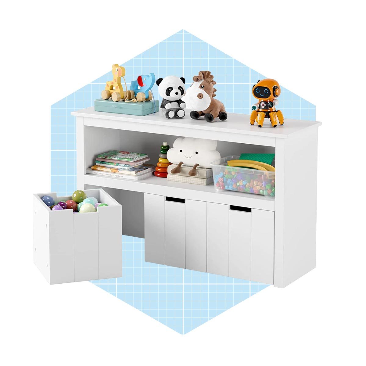 A white storage unit holds toys and books, while a basket beside it contains colorful balls, set against a light blue grid background.