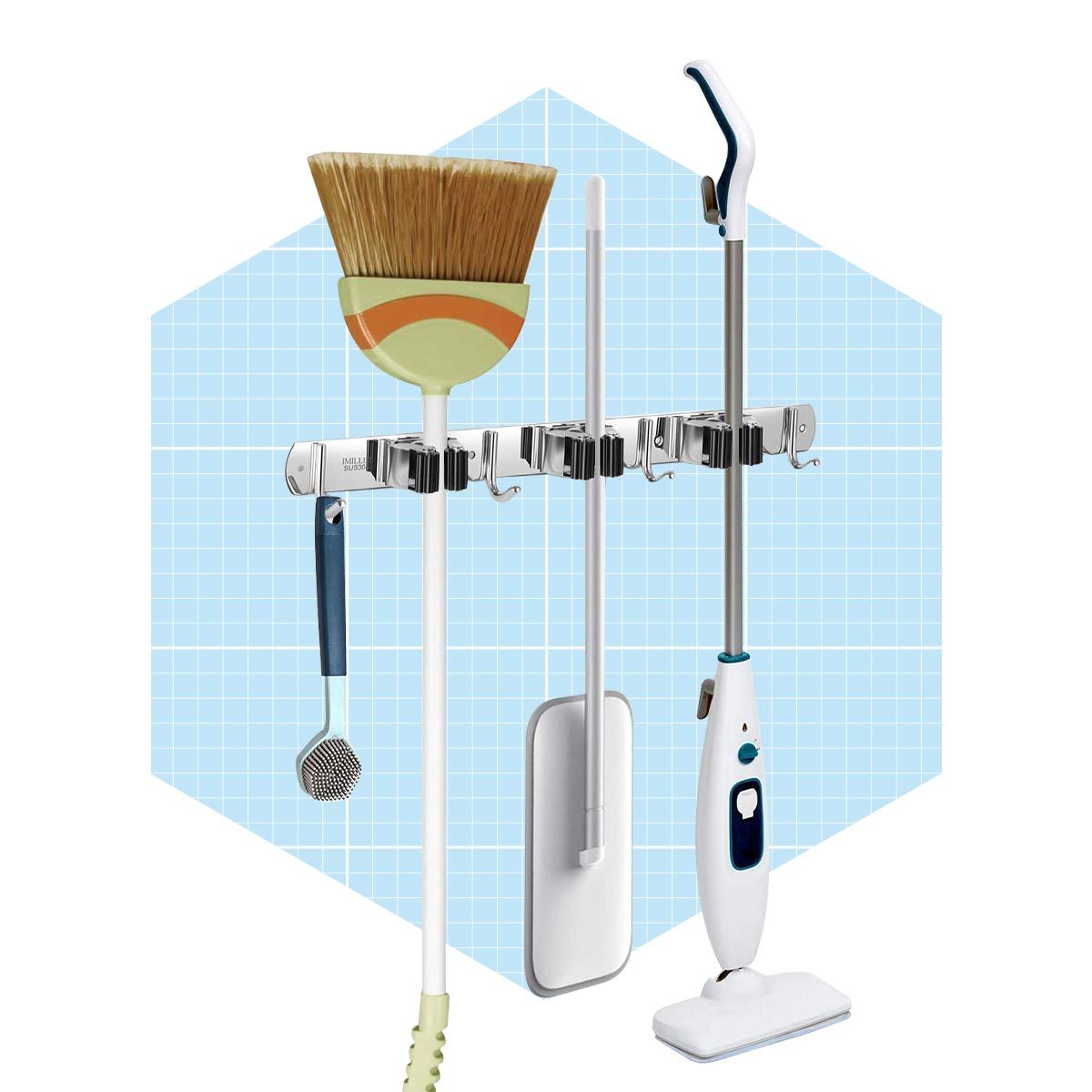 Four cleaning tools hang on a wall-mounted rack against a light blue grid background. They include a broom, mop, duster, and a steam cleaner.