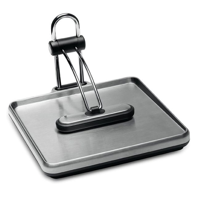 A stainless steel panini press rests on a flat surface, featuring a black handle for pressing, designed to heat and flatten sandwiches efficiently.