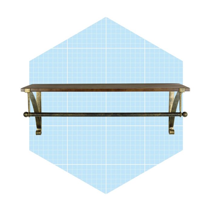A wooden shelf rests on metallic brackets, featuring a support bar underneath, set against a light blue grid-patterned background.