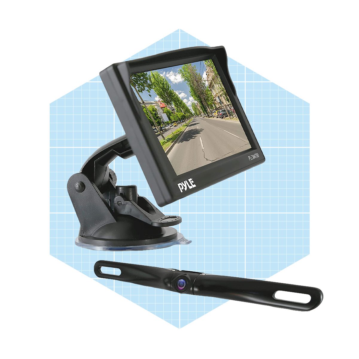 A mounted display shows a road scene, while a small camera is positioned alongside, typically used for vehicle navigation or rear-view assistance.