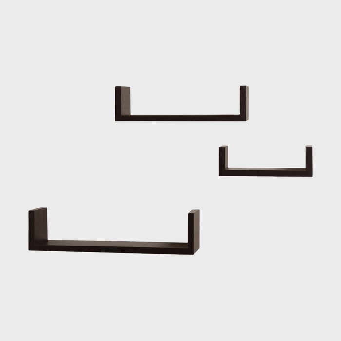 Three black floating shelves are arranged at different heights on a light background, creating a modern and minimalist display option for items.