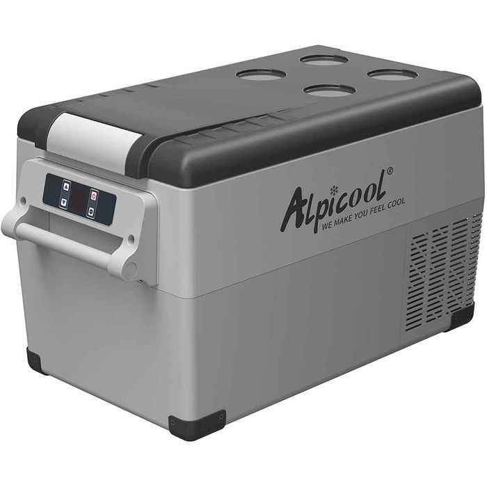 A portable cooler sits stationary, designed to keep items cold, featuring a handle, control panel, and cup holders on the lid for convenience.