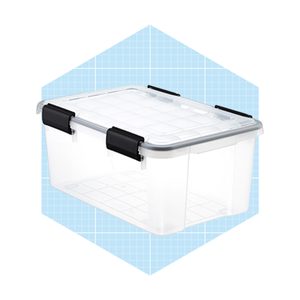 A clear storage container with a lid and black clips sits against a light blue patterned background, designed for organizing items efficiently.