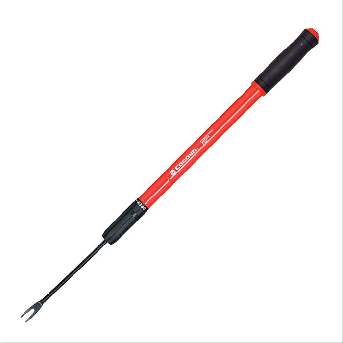 A hand tool with a long red handle and a black grip is positioned vertically; its metal pronged end is meant for cultivating soil.