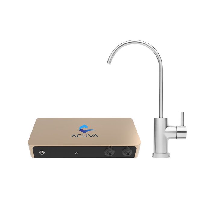 A stylish water purification system features a golden base unit with control knobs, paired with a sleek silver faucet designed for installation in a kitchen environment.