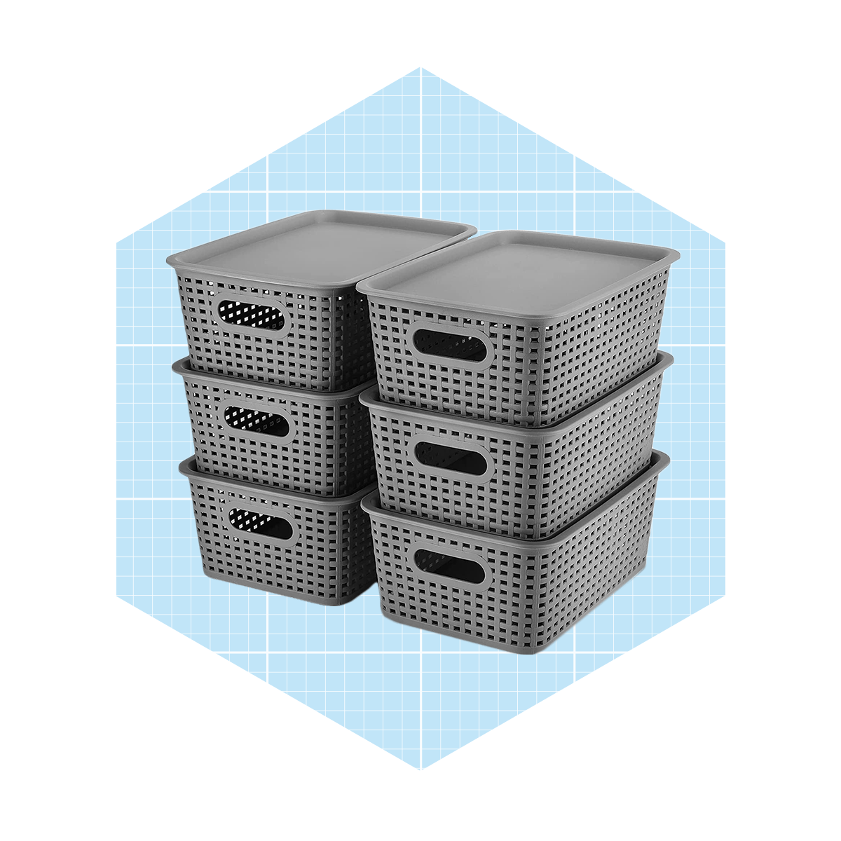 Stacked gray storage baskets are positioned upright against a light blue grid-patterned background, ready to organize various items.