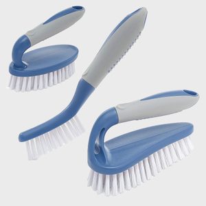 Three cleaning brushes with blue and gray handles rest against a light background, showcasing their varied shapes and bristle designs for different cleaning tasks.