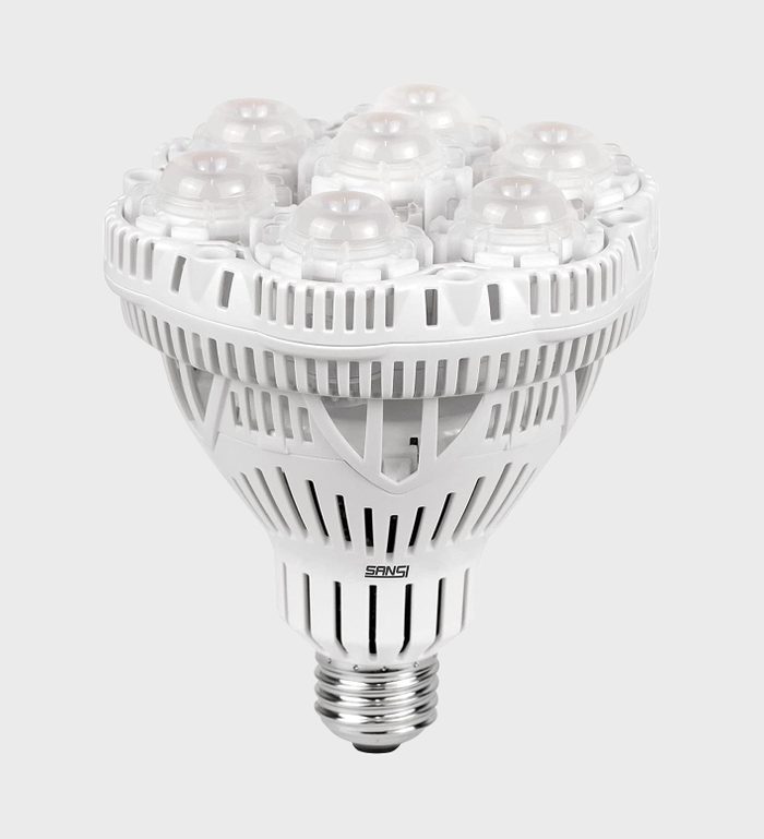 A white LED light bulb with multiple light sources is positioned upright, showcasing a sleek design with ventilation slots, suitable for enhanced illumination in various settings.