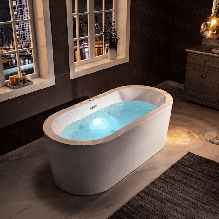 A modern bathtub filled with blue-lit water sits in a stylish bathroom, illuminated by lamps and featuring large windows overlooking a cityscape at night.