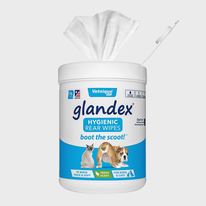 A container of hygienic rear wipes, dispensing a wipe, designed for pet cleanliness. It features animal images and text advertising its use for dogs and cats.