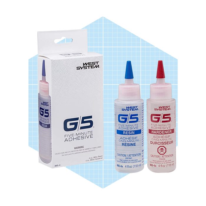 Two bottles of adhesive, one blue labeled 