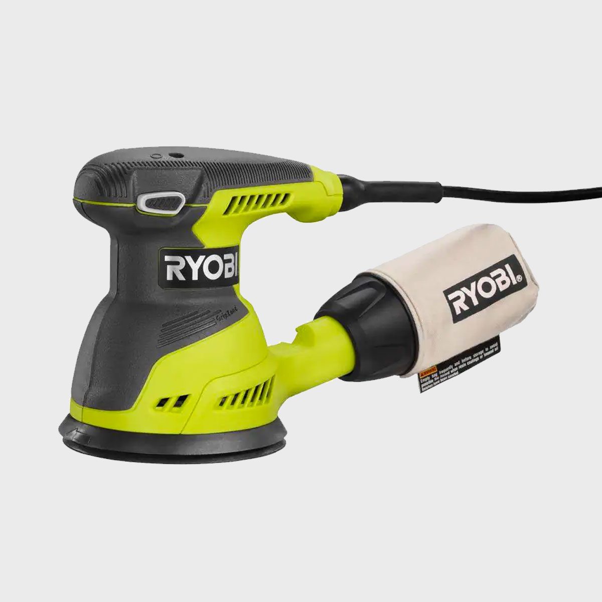 A power sander rests on a flat surface, equipped with a dust collection bag, designed for smoothing surfaces during woodworking tasks.