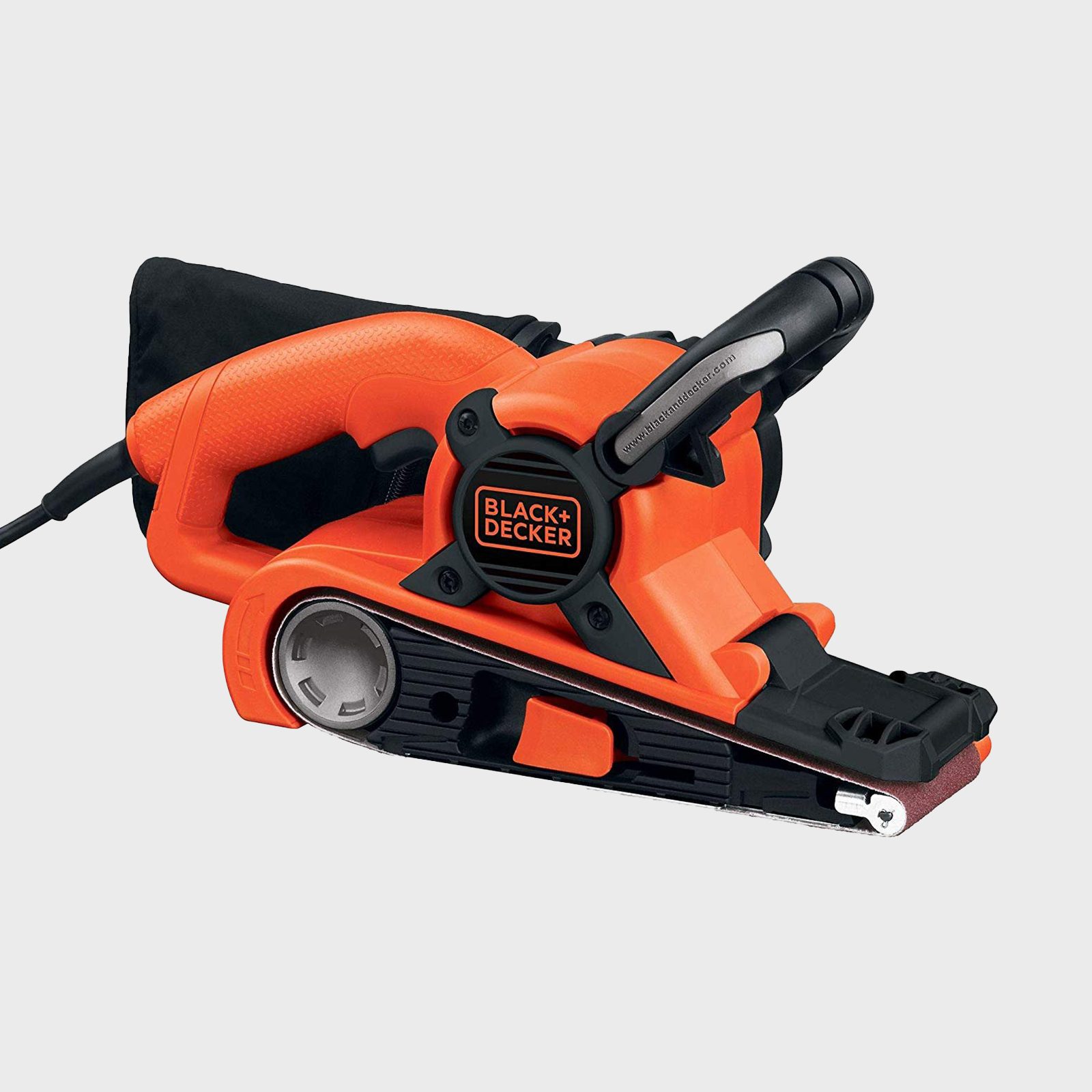 An orange and black belt sander is positioned on a neutral background, designed for smoothing surfaces with a sanding belt attached.