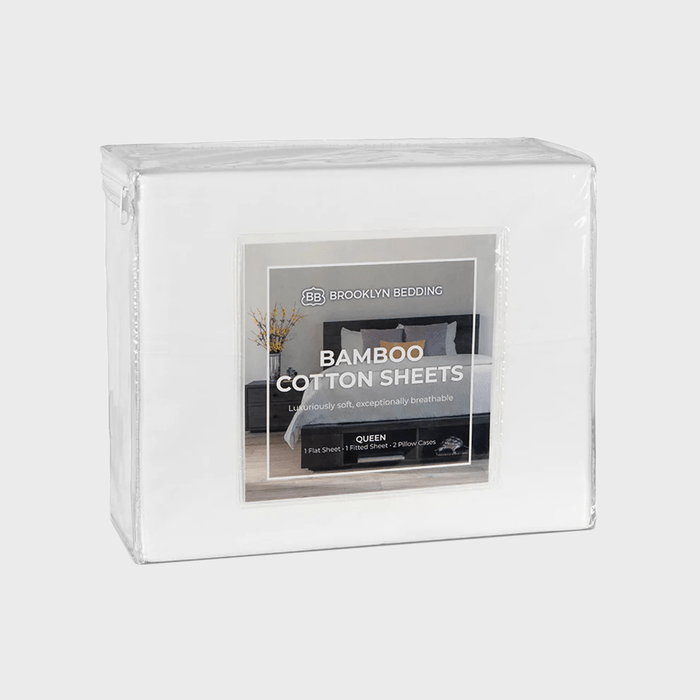 A packaged set of bamboo cotton sheets displays its features, including softness and breathability, against a simple gray background, indicating its suitability for a queen-sized bed.