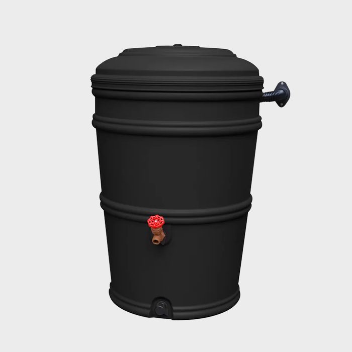 A cylindrical black barrel stands upright, featuring a red faucet at the bottom, designed for dispensing liquid. It's set against a plain light backdrop.