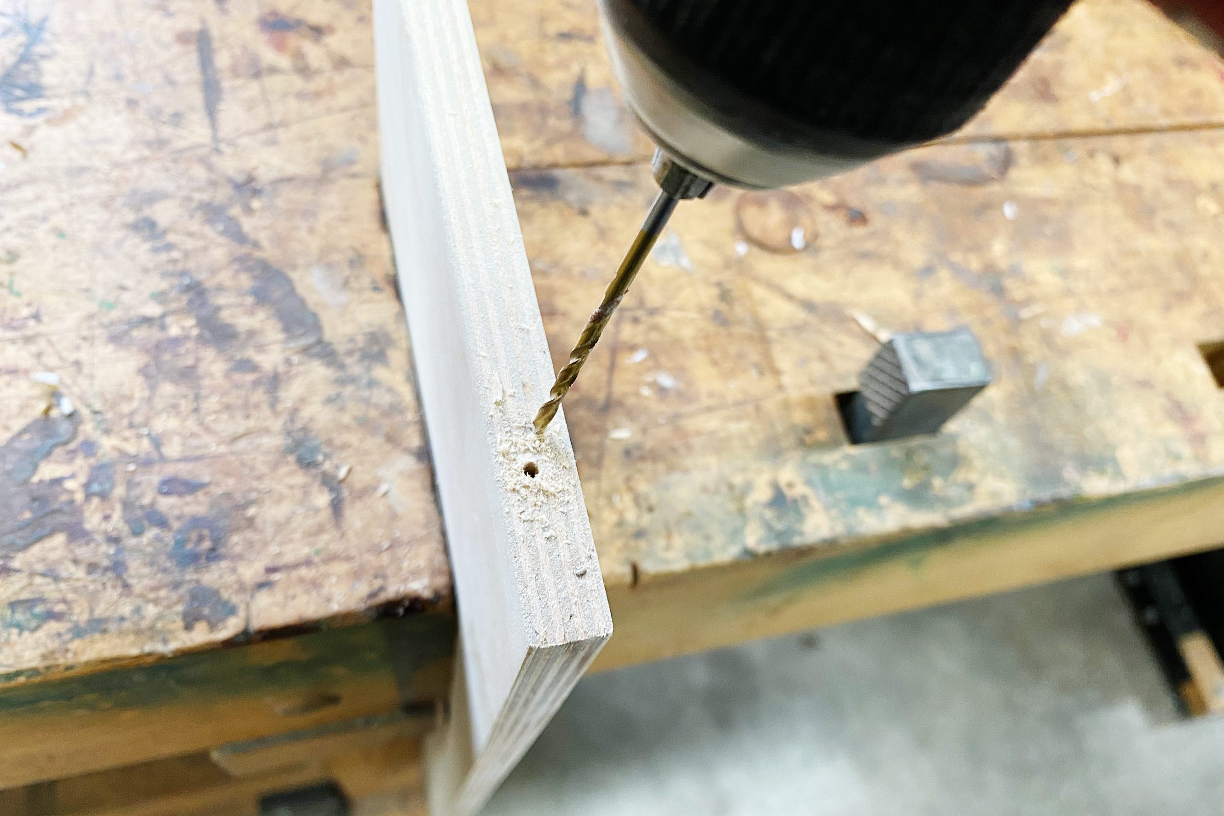 pre-drill spots for screws for DIY drawer dividers