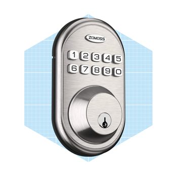 A digital door lock features a keypad for code entry and a keyhole. It is mounted against a light blue grid background.